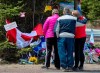 A family pays their respects to victims of the mass killings at a checkpoint on Portapique Road in Portapique, N.S. on Friday, April 24, 2020. Nova Scotians struggling with the devastating aftermath of a mass shooting are looking for a firm commitment from the province's leaders to set up a public inquiry to help answer a growing list of unanswered questions.THE CANADIAN PRESS/Andrew Vaughan