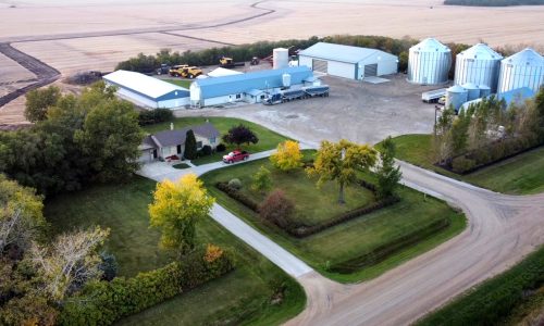 HENERVIC FARMS PHOTO 

An aerial view of the Henervic farmyard, which has been home for generations of the Peters family since Henry Peters began farming in the Randolph area, 75 years ago.