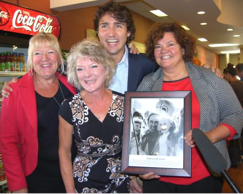 CARILLON ARCHIVES 

During Justin Trudeau’s visit to Steinbach while he was campaigning for the Liberal leadership in 2013, Cindi Rempel-Patrick joined Karen (Enns) Bencharski and Tricia Penner to present a photo of them with Trudeau’s father, former Prime Minister Pierre Trudeau, that appeared on the front page of The Carillon in 1970.