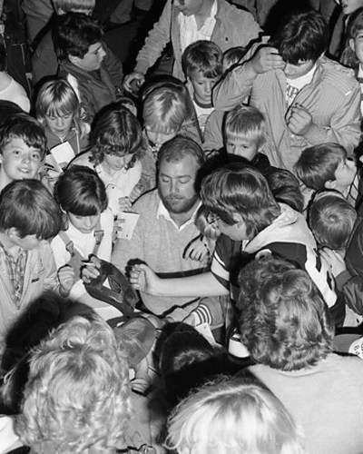 Winnipeg Blue Bombers’ Chris Walby was surrounded by a crowd of young autograph hounds during a recent appearance at the Clearspring Village Mall in Steinbach. The big tackle’s popularity went up another notch when he handled BC’s James (Quick) Parker to help Winnipeg earn a berth in the Grey Cup for the first time in 19 years. (Carillon Archives)