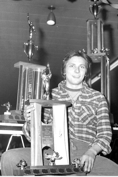 Gary Querel of Winnipeg, has every reason for smiling. The trophy he is holding and the two in the background are his reward for an afternoon of snowmobile racing at Richer on the weekend. Querel won the Gilles Decorating and Gauthier Brothers Aluminum trophy in the 440-Super-mod class; the Lansard Brothers Roofing Trophy for the 340-Super-mod class; and the Godard Forest Products and Godard Ready-Mix Cement Trophy for the 440-X class. (Carillon Archives)