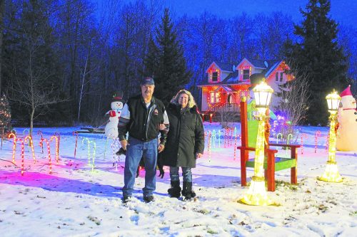 CHRIS GAREAU THE CARILLON 

Ken and April Boer are hosting their final Christmas light show north of Richer after 27 years and multiple generations of families dazzled by the display and stopping by to see Santa.