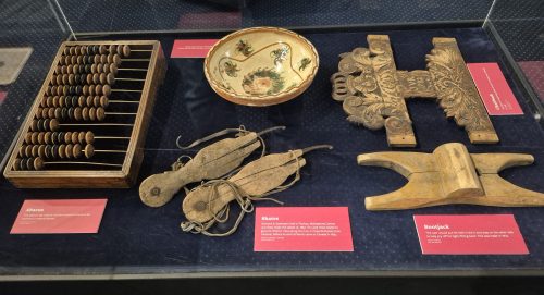 MENNONITE HERITAGE VILLAGE 

The abacus, skates, bowl, chairback, and bootjack represent life in Imperial Russia including business, leisure, and everyday activities. The chairback dates to the Mennonites’ time in Prussia, prior to their move to Imperial Russia.