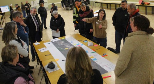 CHRIS GAREAU THE CARILLON
Urban Systems' Rachelle Kirouac listens to ideas from Lorette residents and describes possibilities for the future of Dawson Road at an open house Jan. 14.