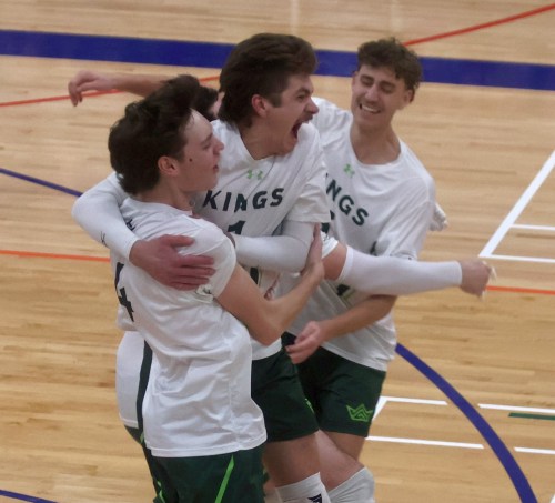 Red Deer's Zachary Neufeld celebrates with teammates following the final point of the CCAA national men's volleyball championships in Niverville. (Cassidy Dankochik The Carillon)